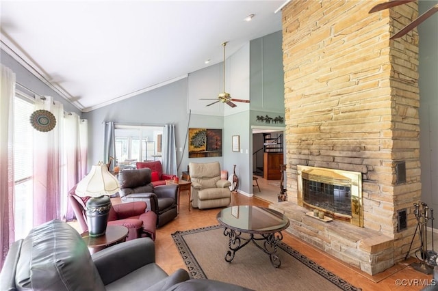 17009 Faithful Run, Montpelier, VA 23192 - living room featuring a ceiling fan, a fireplace, wood finished floors, and high vaulted ceiling