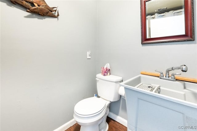 17009 Faithful Run, Montpelier, VA 23192 - half bathroom featuring baseboards and wood finished floors