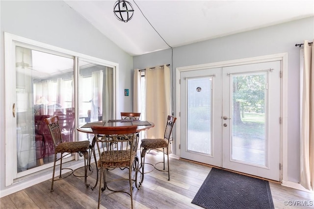 17009 Faithful Run, Montpelier, VA 23192 - dining room featuring french doors, lofted ceiling, and light wood-type flooring