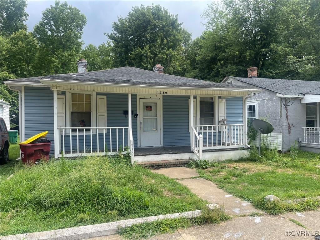 1730 Dupuy Rd, Petersburg, VA 23803 - bungalow-style house with a porch and a chimney