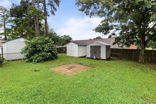 204 Prince Albert Ave, Colonial Heights, VA 23834 - fenced backyard featuring a storage shed