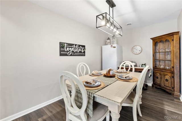 204 Prince Albert Ave, Colonial Heights, VA 23834 - dining area featuring dark wood-type flooring and baseboards