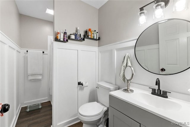 204 Prince Albert Ave, Colonial Heights, VA 23834 - bathroom featuring wood finished floors, a decorative wall, wainscoting, and vanity