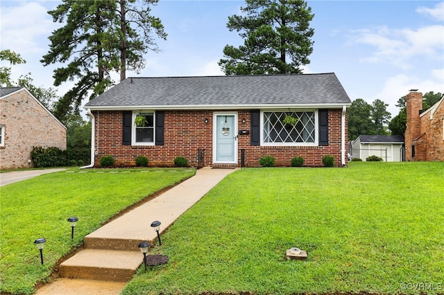 204 Prince Albert Ave, Colonial Heights, VA 23834 - view of front facade with a front yard, brick siding, and roof with shingles