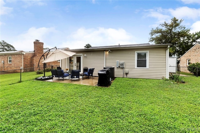 204 Prince Albert Ave, Colonial Heights, VA 23834 - back of property with a patio and a fenced backyard
