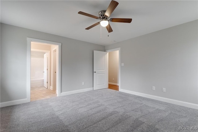 68 Halls Store Rd, Mineral, VA 23117 - unfurnished bedroom with carpet floors, ceiling fan, and connected bathroom