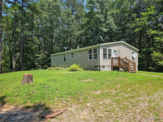 467 Oakland Rd, Farnham, VA 22460 - back of property with crawl space and a lawn