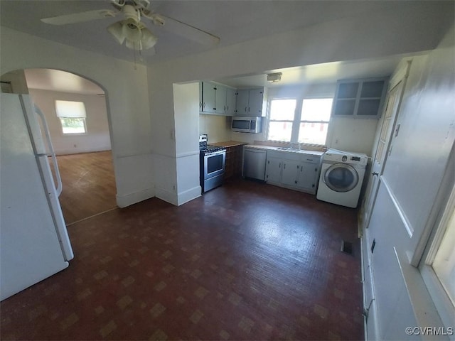 4870 E Water View Rd, Water View, VA 23180 - kitchen with washer / dryer, appliances with stainless steel finishes, arched walkways, ceiling fan, and plenty of natural light