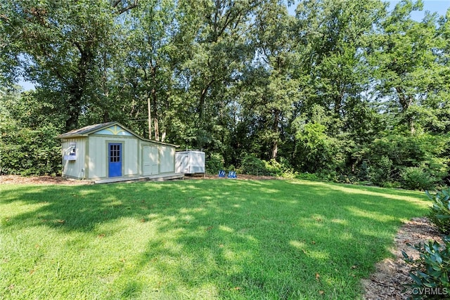 6482 Robin Way, Mechanicsville, VA 23111 - view of green lawn with a shed
