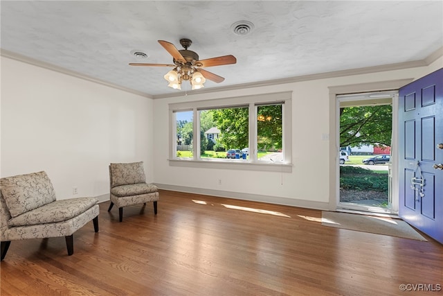 6482 Robin Way, Mechanicsville, VA 23111 - sitting room featuring wood finished floors, crown molding, and ceiling fan