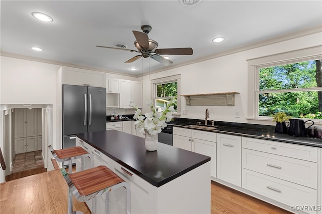 6482 Robin Way, Mechanicsville, VA 23111 - kitchen with stainless steel appliances, dark countertops, open shelves, ceiling fan, and recessed lighting