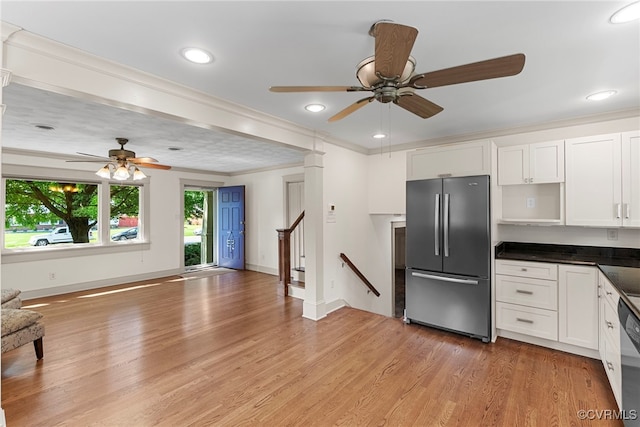 6482 Robin Way, Mechanicsville, VA 23111 - kitchen with appliances with stainless steel finishes, a ceiling fan, light wood-style floors, white cabinets, and ornamental molding