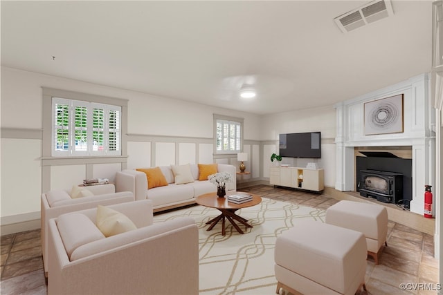 6482 Robin Way, Mechanicsville, VA 23111 - living room with a wood stove and light stone finish flooring