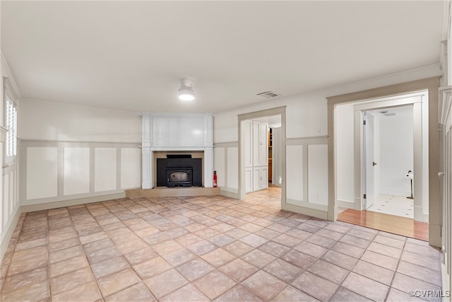 6482 Robin Way, Mechanicsville, VA 23111 - unfurnished living room with a decorative wall and a large fireplace