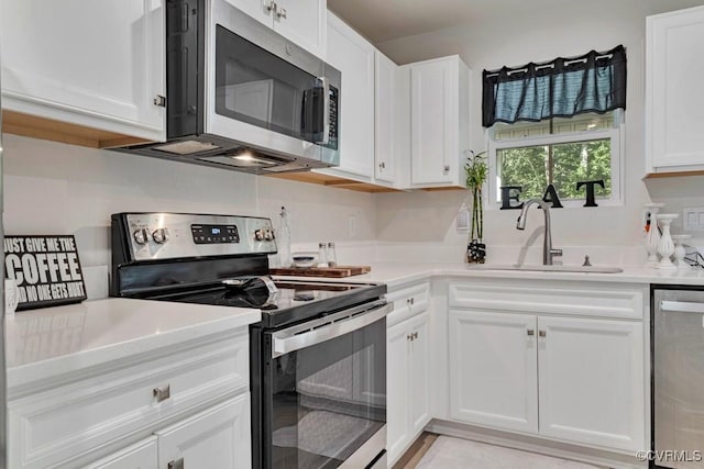 5812 Addison Gate Dr, North Chesterfield, VA 23234 - kitchen featuring appliances with stainless steel finishes, white cabinets, and light countertops