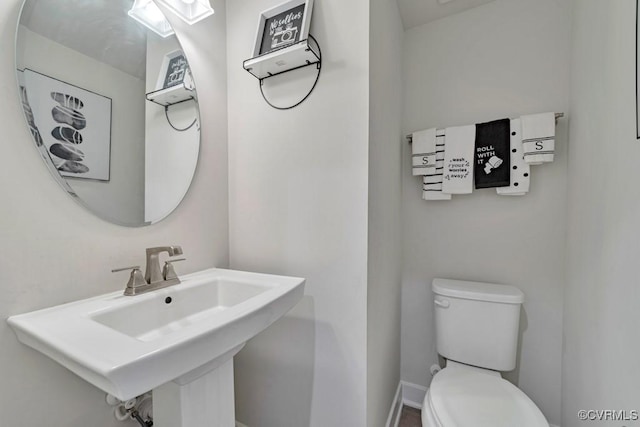 5812 Addison Gate Dr, North Chesterfield, VA 23234 - half bath featuring toilet and baseboards