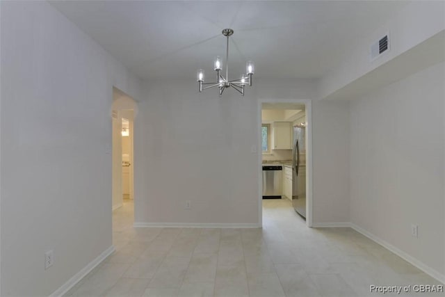 164 Lake One Dr, Hampton, VA 23666 - empty room featuring a chandelier, arched walkways, and light tile patterned floors