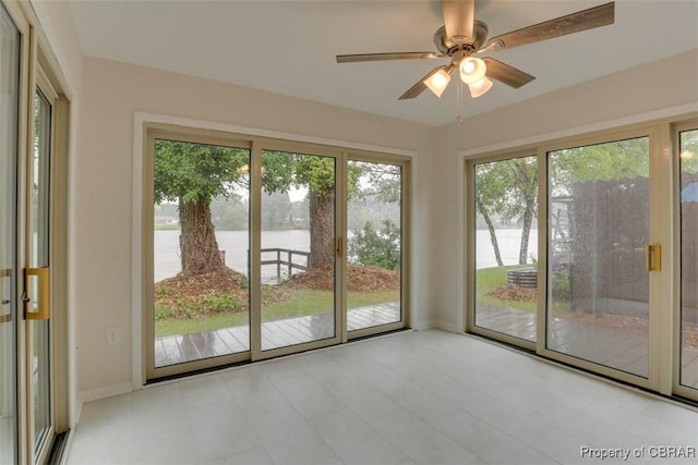 164 Lake One Dr, Hampton, VA 23666 - unfurnished sunroom with a water view and baseboards
