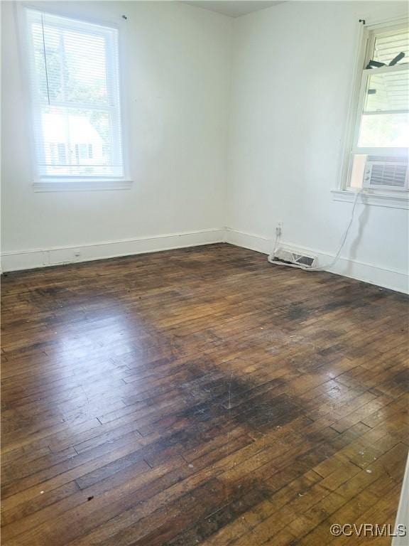 1227 Hilton Pl, Petersburg, VA 23803 - unfurnished room with dark wood-type flooring and cooling unit