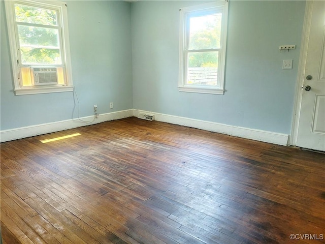 1227 Hilton Pl, Petersburg, VA 23803 - spare room featuring dark wood finished floors and cooling unit