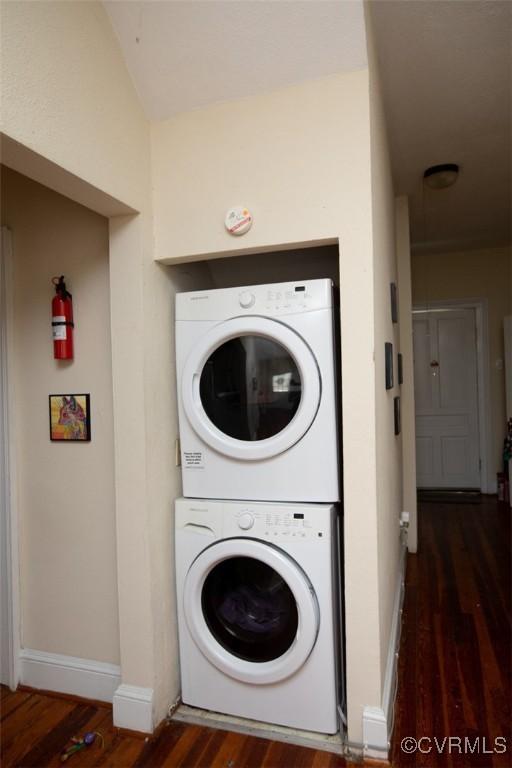 405 E 2nd St, Farmville, VA 23901 - washroom with stacked washer / drying machine and wood finished floors