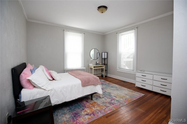 405 E 2nd St, Farmville, VA 23901 - bedroom featuring radiator heating unit, wood finished floors, and crown molding