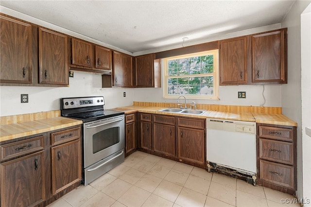9502 Timber Pass, Glen Allen, VA 23060 - kitchen featuring white dishwasher, stainless steel range with electric cooktop, light countertops, light tile patterned floors, and a textured ceiling