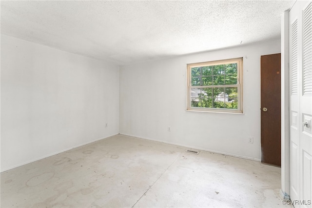 9502 Timber Pass, Glen Allen, VA 23060 - empty room with unfinished concrete flooring and a textured ceiling