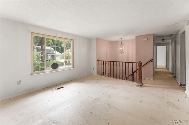9502 Timber Pass, Glen Allen, VA 23060 - unfurnished room featuring a chandelier and a textured ceiling