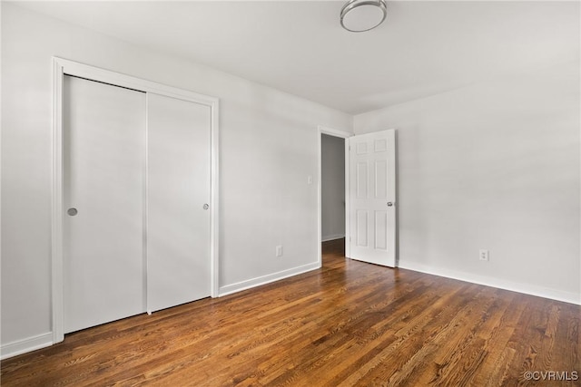6437 Moon Ln, Chesterfield, VA 23234 - unfurnished bedroom featuring wood finished floors and a closet