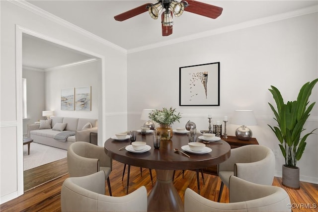 6437 Moon Ln, Chesterfield, VA 23234 - dining area with wood finished floors, a ceiling fan, and ornamental molding