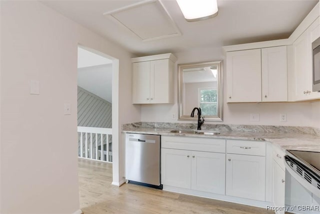 7 Cathy Dr, Newport News, VA 23608 - kitchen featuring stainless steel appliances, white cabinets, light wood-type flooring, and light stone countertops