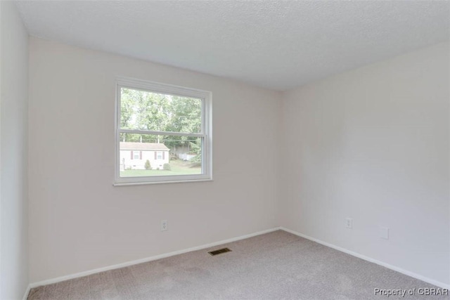 7 Cathy Dr, Newport News, VA 23608 - empty room with carpet floors and baseboards