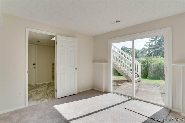7 Cathy Dr, Newport News, VA 23608 - empty room with carpet floors, a textured ceiling, and stairway