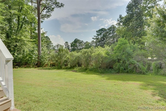 7 Cathy Dr, Newport News, VA 23608 - view of grassy yard featuring view of wooded area