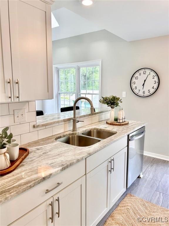 11809 Park Forest Ct, Henrico, VA 23059 - kitchen featuring stainless steel dishwasher, decorative backsplash, light stone counters, white cabinets, and recessed lighting