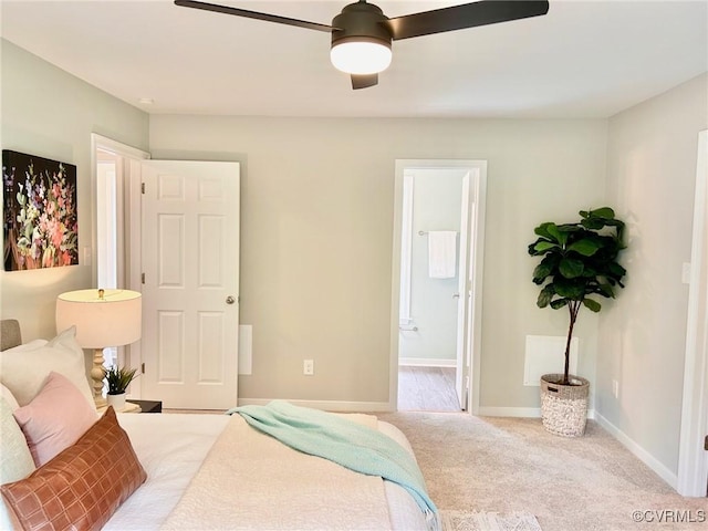 11809 Park Forest Ct, Henrico, VA 23059 - bedroom with carpet, connected bathroom, and a ceiling fan
