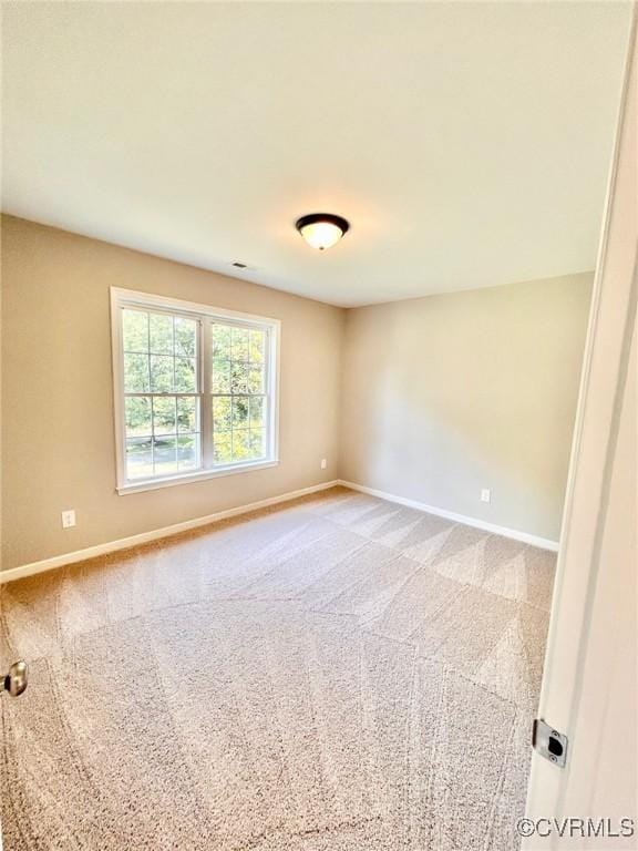 11809 Park Forest Ct, Henrico, VA 23059 - carpeted spare room with baseboards