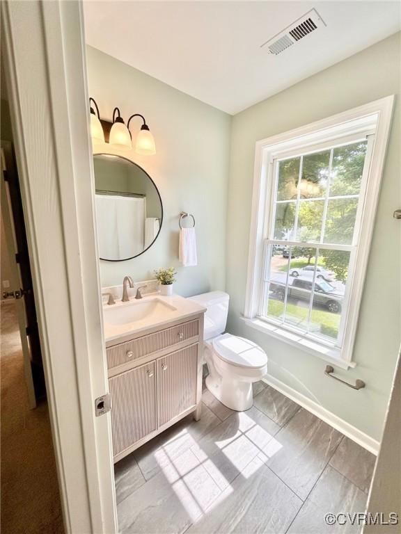 11809 Park Forest Ct, Henrico, VA 23059 - bathroom featuring vanity and toilet