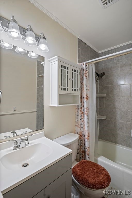 15116 Boydton Plank Rd, Dinwiddie, VA 23841 - full bath with ornamental molding, vanity, and shower / bath combo
