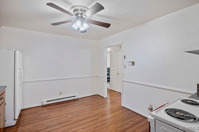 15116 Boydton Plank Rd, Dinwiddie, VA 23841 - kitchen with a baseboard radiator, white appliances, ceiling fan, and wood finished floors