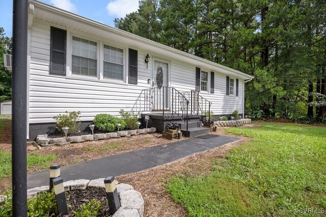 15116 Boydton Plank Rd, Dinwiddie, VA 23841 - ranch-style house featuring a front yard