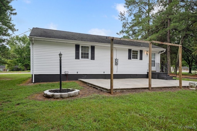 15116 Boydton Plank Rd, Dinwiddie, VA 23841 - rear view of property with a patio, a yard, crawl space, and a shingled roof