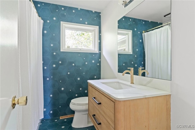 2301 Essex Rd, Henrico, VA 23228 - full bath featuring vanity, tile patterned floors, tile walls, and curtained shower