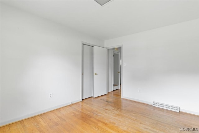 2301 Essex Rd, Henrico, VA 23228 - empty room featuring baseboards and light wood-style flooring