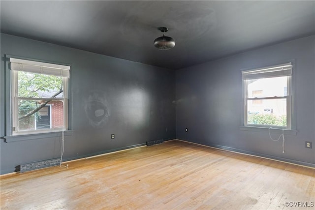 2301 Essex Rd, Henrico, VA 23228 - spare room with light wood-type flooring and plenty of natural light