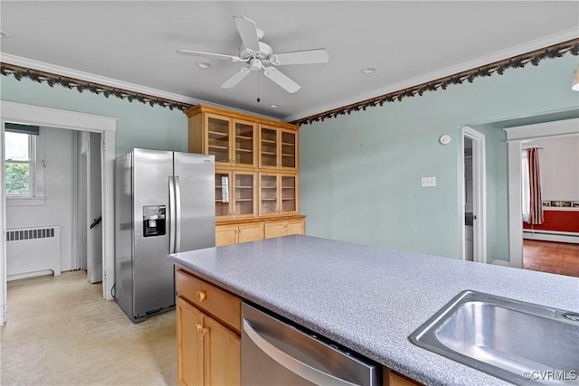 285 Jennings Ordinary Rd, Crewe, VA 23930 - kitchen featuring appliances with stainless steel finishes, radiator heating unit, a baseboard radiator, a ceiling fan, and ornamental molding