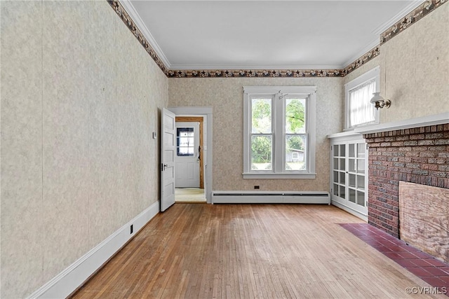 285 Jennings Ordinary Rd, Crewe, VA 23930 - unfurnished living room with baseboard heating, hardwood / wood-style flooring, crown molding, and a fireplace
