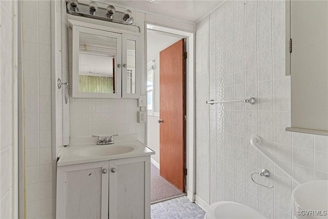285 Jennings Ordinary Rd, Crewe, VA 23930 - bathroom featuring tile walls and vanity