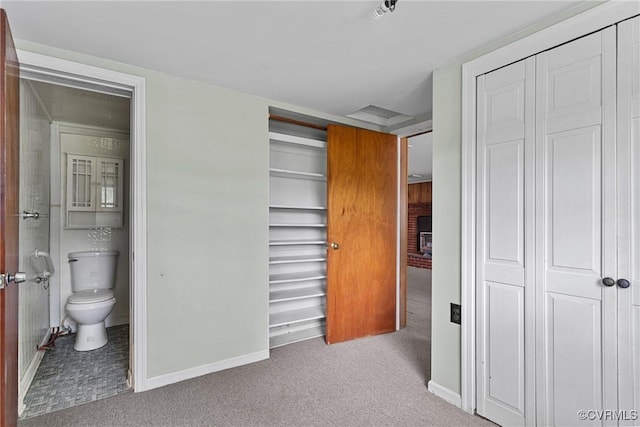 285 Jennings Ordinary Rd, Crewe, VA 23930 - unfurnished bedroom featuring carpet floors, ensuite bath, and multiple closets